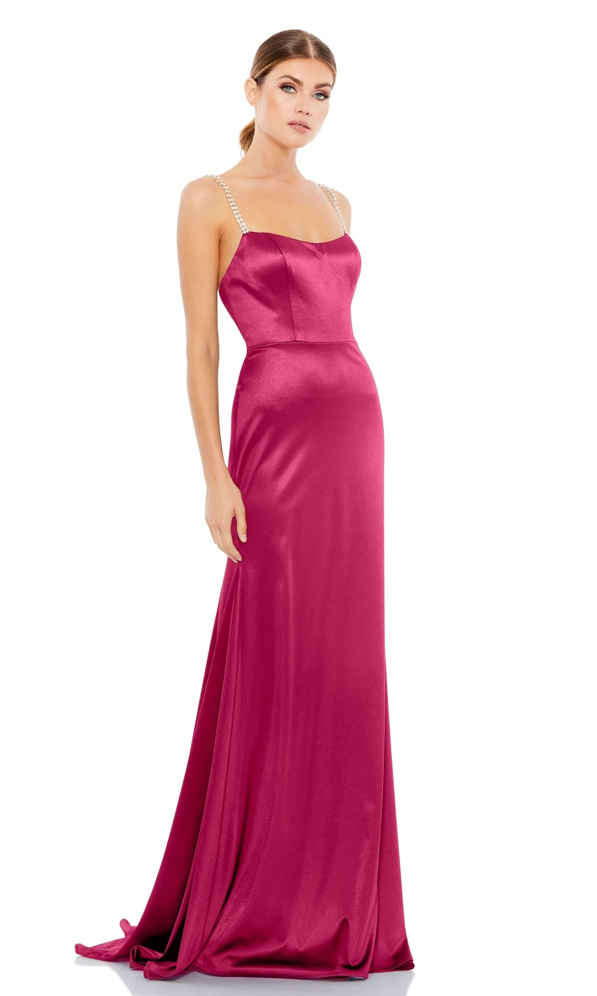A woman models the Hot Pink Long Prom Dress with Sweep Train 12428, featuring rhinestone shoulder straps, against a white background.